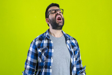 Face of an angry and furious male. The image is depicting emotions of anger and frustration