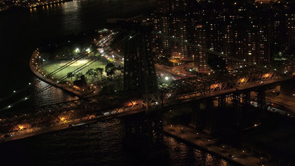AERIAL: Dense traffic on Williamsburg Bridge highway leading to Manhattan, NYC
