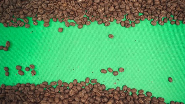 Barista spends his hand on coffee beans, green screen, video transition. 
