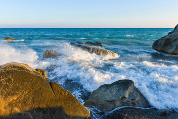 Fototapeta na wymiar Sea waves and rocky beach