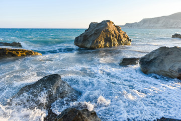 Sea waves and rocky beach
