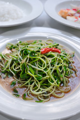 stir fried sunflower sprout with oyster sauce and chili