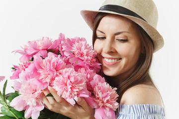 Close up young tender woman in blue dress, hat holding bouquet of pink peonies flowers isolated on white background. St. Valentine's Day, International Women's Day holiday concept. Advertising area.