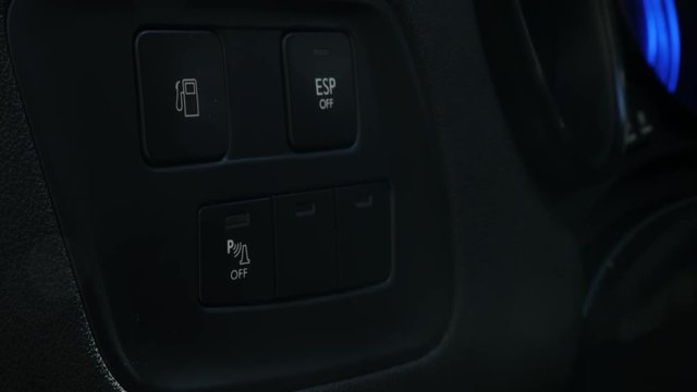 Car fuel tank control button pressing 4K footage