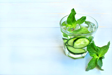 Detox water with cucumber and mint, copy space.