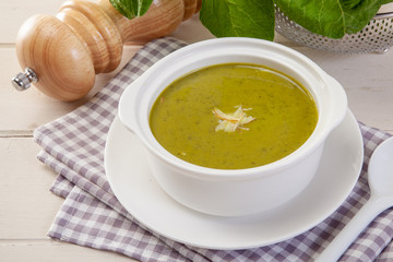 Spinach cream soup in bowl