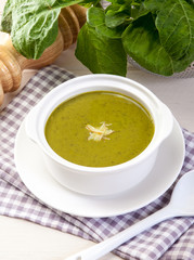 Spinach cream soup in bowl