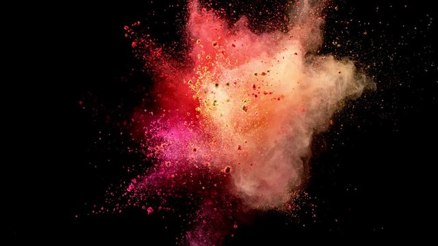 Super slow motion of colored powder explosion isolated on black background. Filmed on high speed cinema camera, 1000fps.