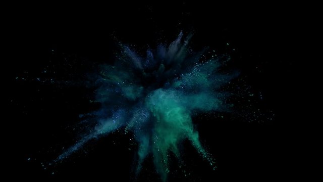 Super slow motion of colored powder explosion isolated on black background. Filmed on high speed cinema camera, 1000fps.
