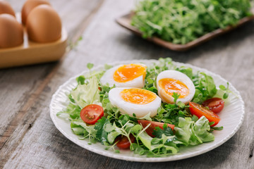 Soft boiled eggs with toast. Healthy fitness breakfast.