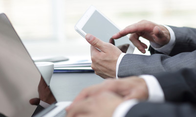 closeup.businessman working on laptop