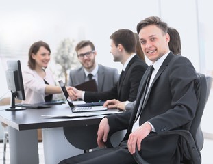business team with a senior Manager in the foreground