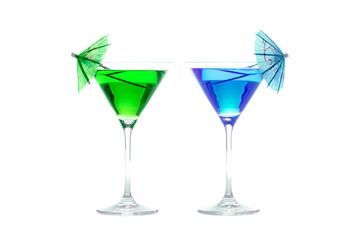 Party or vacation cocktails. Green and blue fun drinks in cocktail glasses isolated against white background.