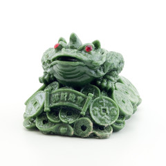 Money frog of jade on a black background