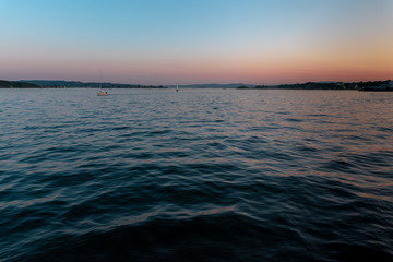 Fototapeta na wymiar Impressive, spectacular sunset at the sea. Horizon of the sea. 
