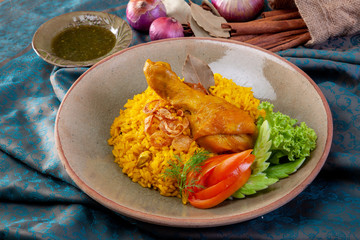 yellow rice with chicken or chicken biryani with rice