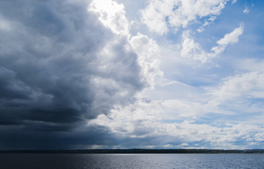 Naklejka na ściany i meble Cloudy sky above river Volga near Kazan, Russia