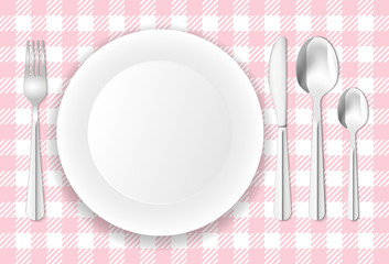 Table-cloth, porcelain plate and stainless cutlery