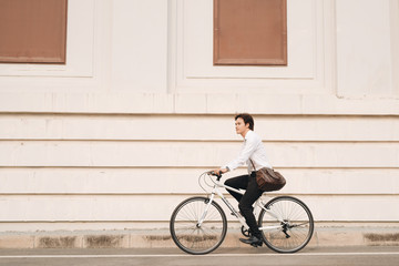 Fototapeta premium lifestyle, transport and people concept - young man on city street