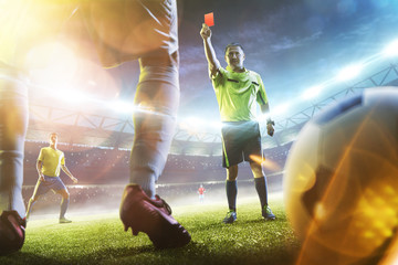 Soccer referee showing a red card