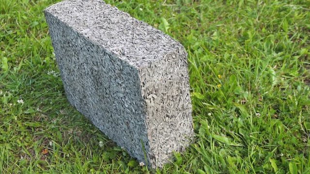 building cement block on grass in Sunny weather