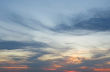 Naklejka na ściany i meble Beautiful colored sunset in blue sky, natural background