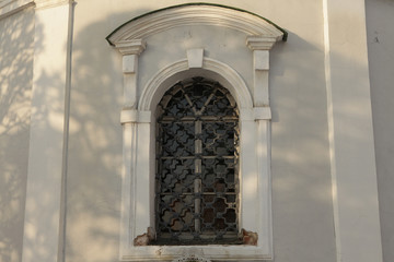 Obraz premium Texture of stucco, wooden facade of an old house.