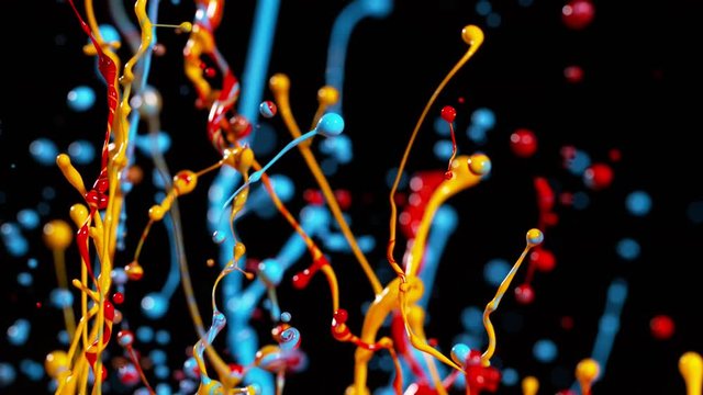 Colorful splashing paint in super slow motion. Shot with high speed cinema camera, 2000fps