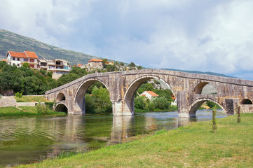 Ancient stone bridge. Bosnia and Herzegovina, Trebinje. View of Arslanagic Bridge over Trebisnjica river