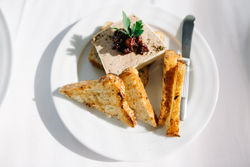 Delicious chicken breast with tomato sauce in frying pan. Top view, flat lay