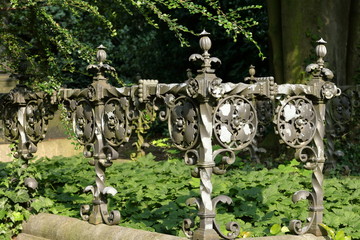 four wrought-iron posts