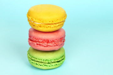 French macaroons on blue background