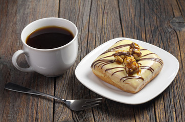 Coffee and glazed square donut