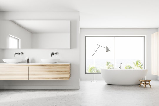 White panoramic bathroom sink and tub