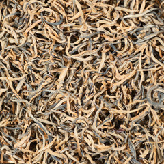 Golden Threads / Perfectly suitable tea composition for backgrounds and textures.
Many different varieties and shapes on one square photo. Top view.
The High-End Tea of China.
