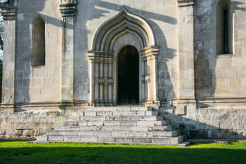 The entrance, framed by an arched perspective portal in the tradition of old Russian architecture, was built in the 15th century. Moscow. Russia.