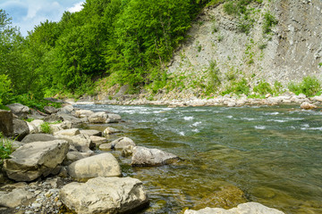 The mountain river in the Carpathians is a landscape. The Prut River, Yaremche, Ukraine.