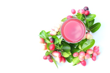 Carissa carandas juice on white background