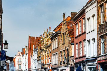 Fototapeta na wymiar BRUGES, BELGIUM - April 13, 2018: view of Buildings around Bruges, Belgium