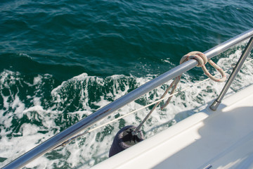 Sea waves splashing, yacht track	