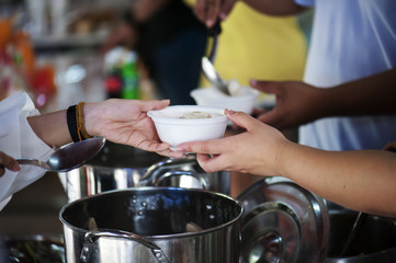 Donate food to the beggar. charity concept