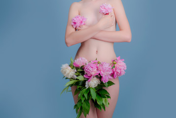 Menstruation, cycle, female cycle, woman period. Young woman with pink flowers. Depilation, clean skin, body care. Spa and Relaxation. Women's themes, girl health. Sexy girl with beautiful ideal body - 209357480