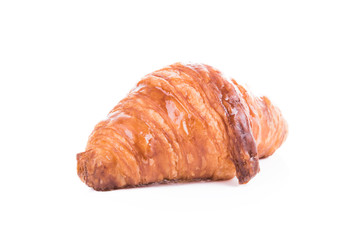 A croissant on white background