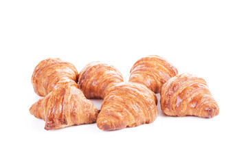 Fresh croissants isolated on white background