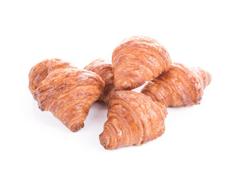 Fresh croissants isolated on white background