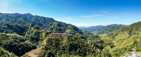 Fototapeta na wymiar Panoramic view of the beautiful rice terraces of Banuae, Philippines