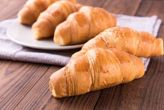 Freshly baked butter croissant. Closeup