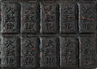 oolong da hong pao tile/ Perfectly suitable tea composition for backgrounds and textures.
Many different varieties and shapes on one square photo. Top view.
The High-End Tea of China.
