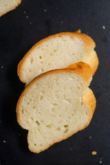 bread baguette cereals black background