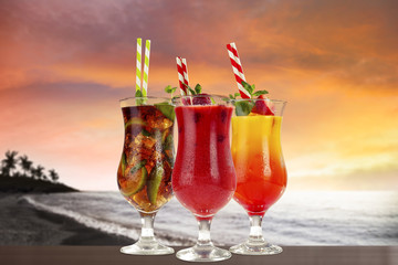 fresh cold summer drink and golden sunset time 